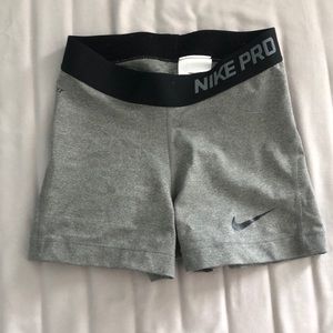 grey and black nike pro